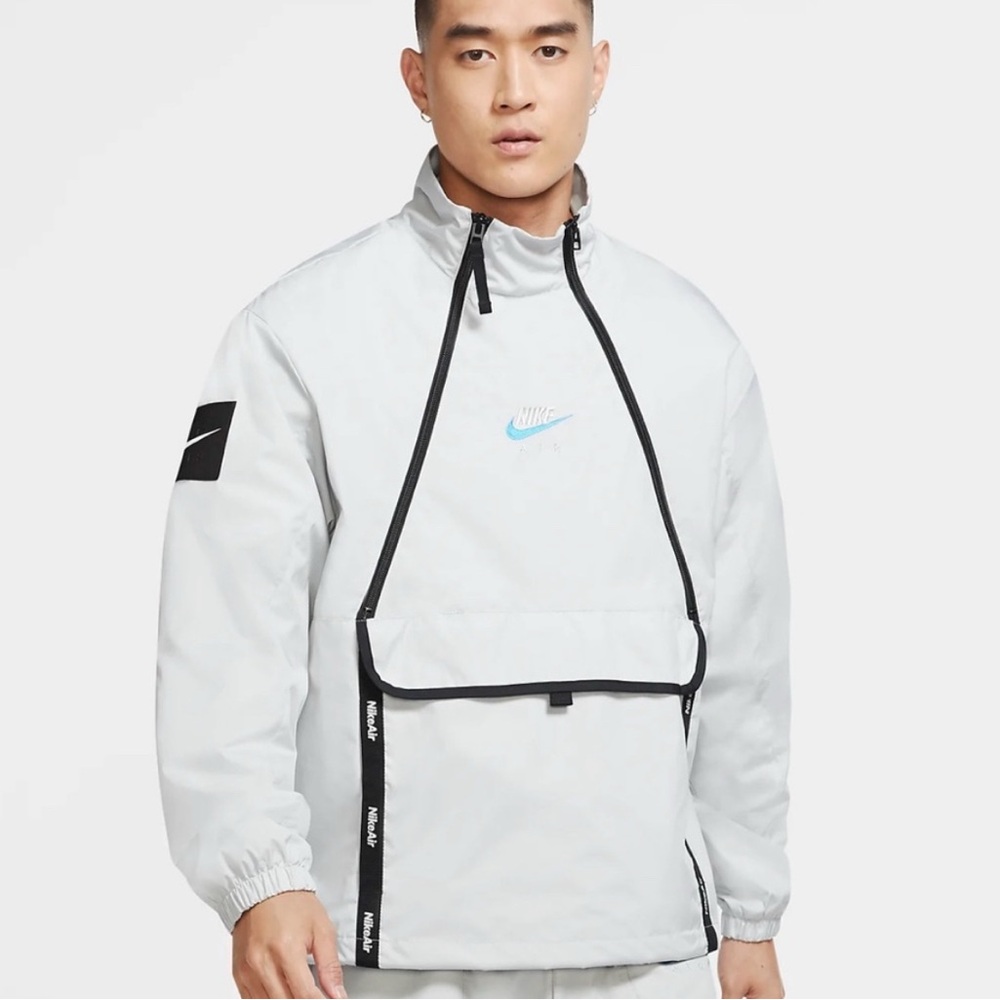 Nike Men's Light Gray Windbreaker with Blue Logo